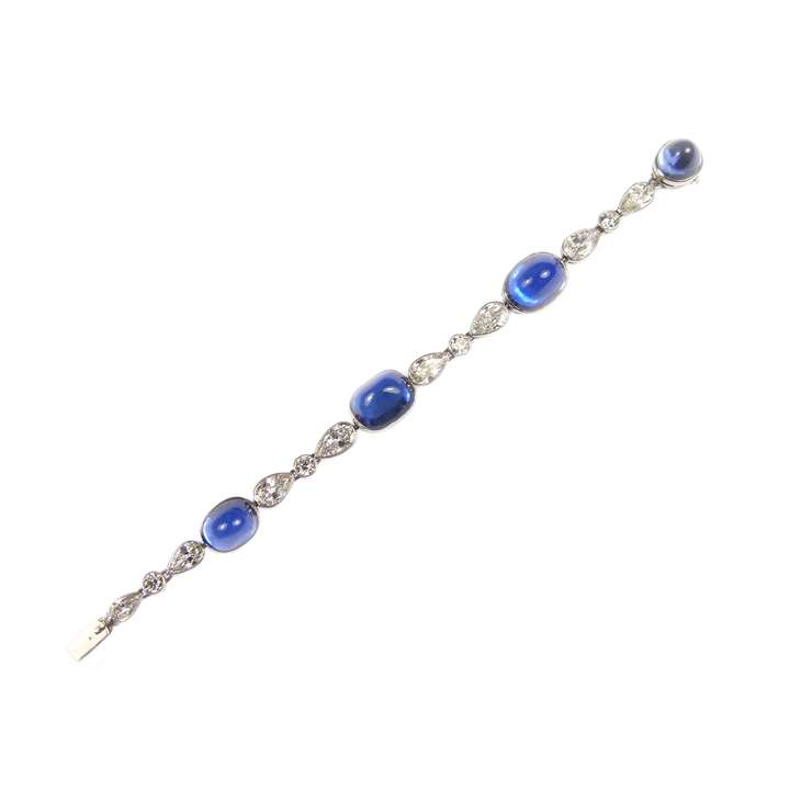 Antique cabochon sapphire and diamond bracelet, set with four sugarloaf Ceylon sapphires